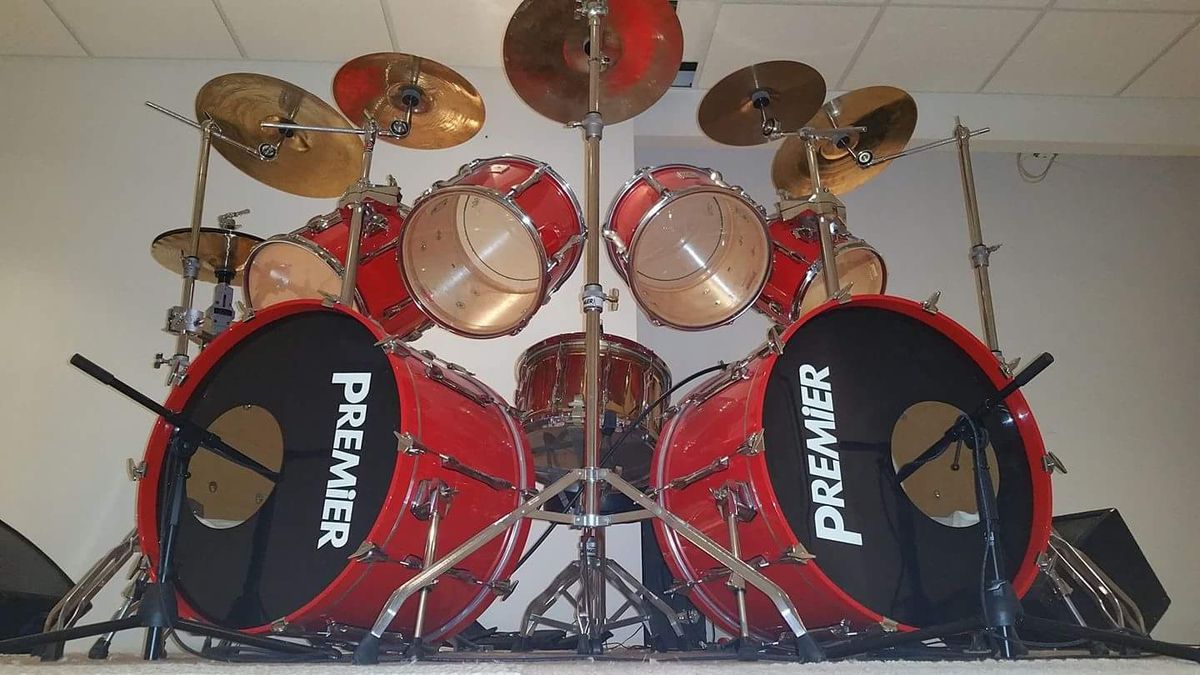 Premier double-bass kit in Inferno Red, front view showing two 24-inch kick drums