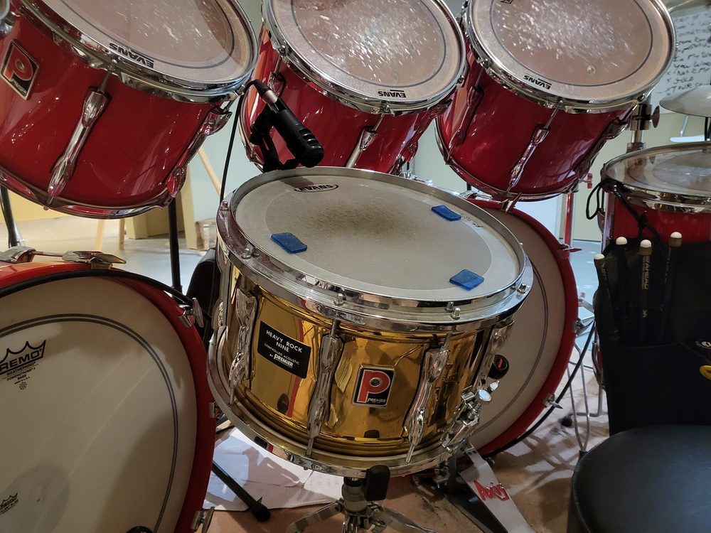 Premier Heavy Rock Nine brass snare drum close-up with Evans batter head